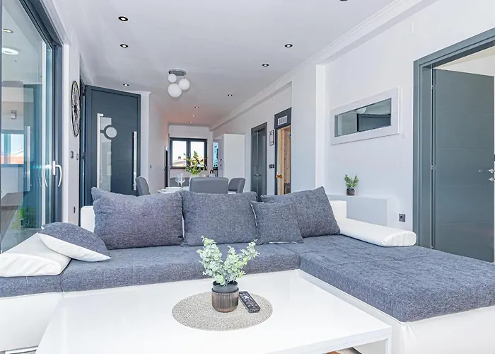 Апартаменты Lovely In With Sauna